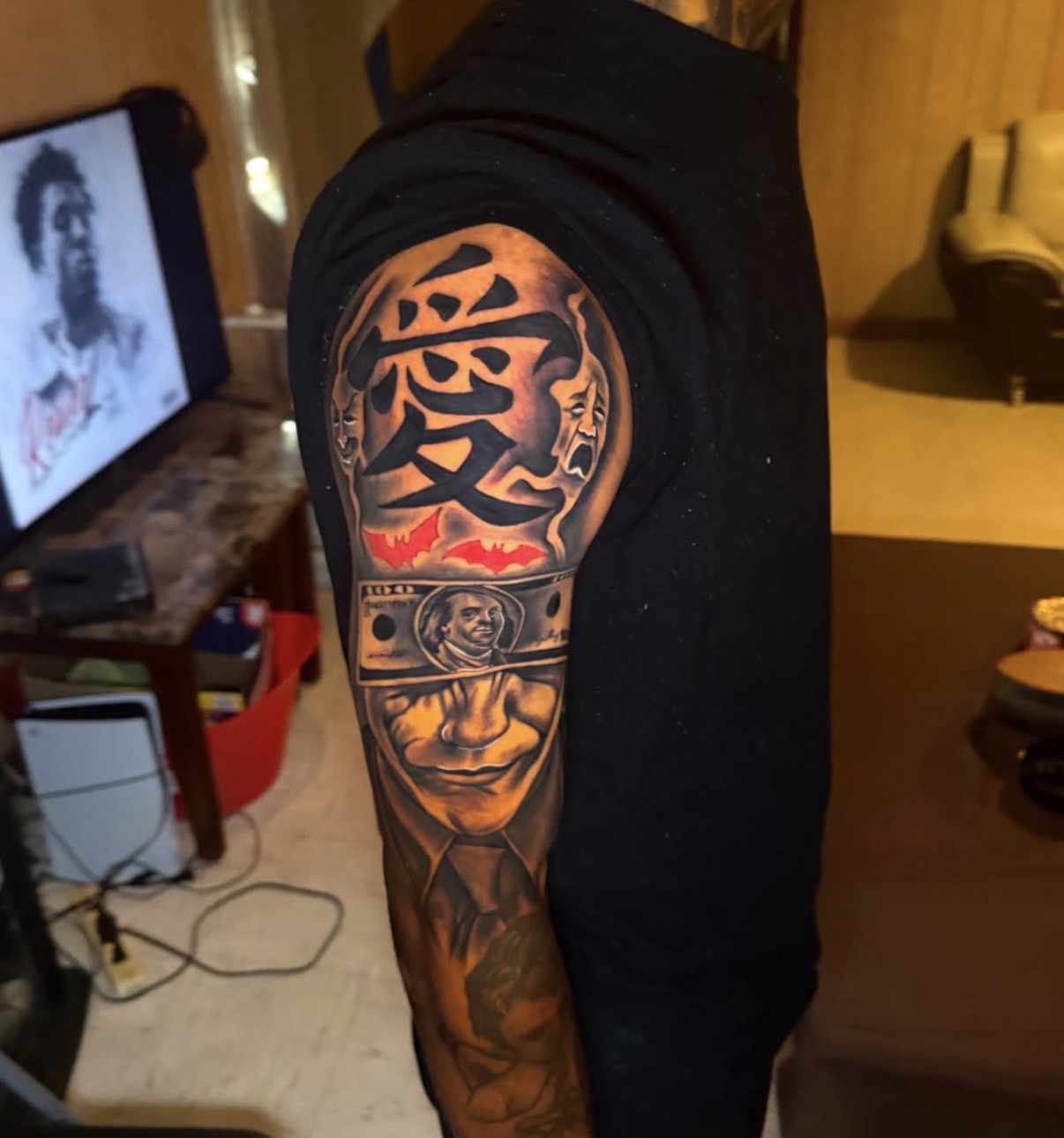 Black and gray Japanese kanji and portrait half sleeve by Erick