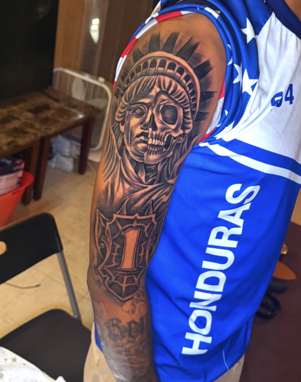 Statue of Liberty skull sleeve tattoo by Erick